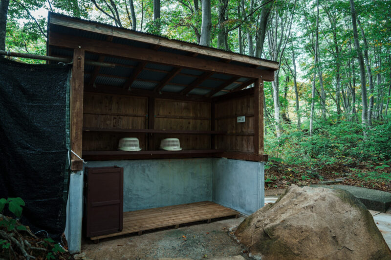 Donation box inside changing room at Amakazari Kogen Onsen free public bat