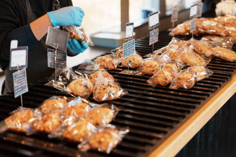 Modern triangular-roof interior of CHAVATY HAKUBA, a scenic tea latte café in the Japanese Alps, featuring floor-to-ceiling windows with panoramic mountain views and a stylish wood-beamed design — a must-visit spot for tea lovers and architecture enthusiasts in Hakuba.