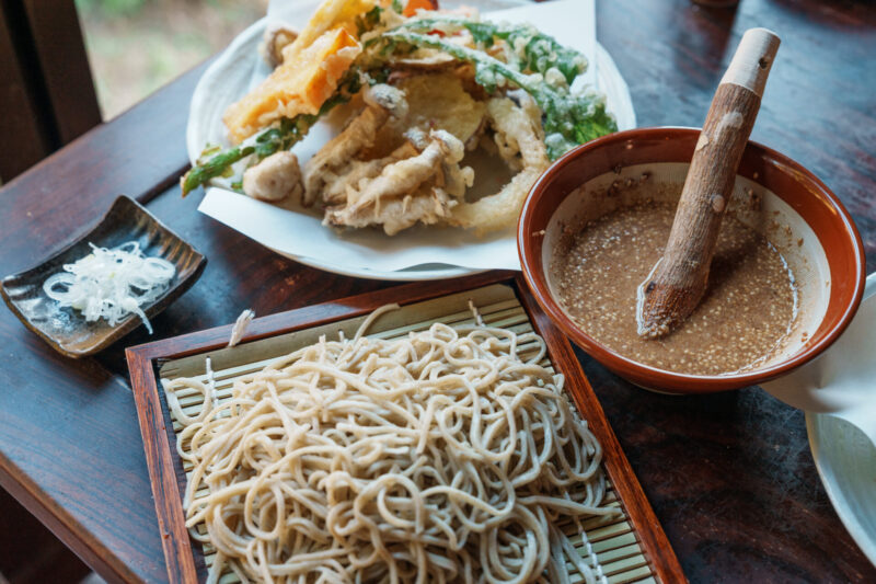 DSC07848 Girl looking out to Hakuba Valley from the outdoor terrace of CHAVATY HAKUBA.