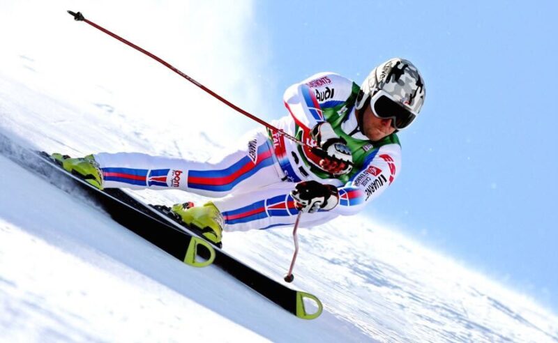 Alpine skiing Ao Lakeside Café exterior with wooden deck and lake view in Hakuba, Nagano, Japan