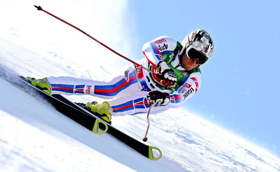 Alpine skiing Ao Lakeside Café exterior with wooden deck and lake view in Hakuba, Nagano, Japan